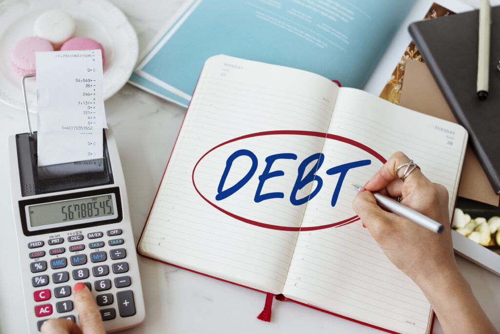 Comparison of internal collections and professional debt recovery services for recovering overdue business debts efficiently.
